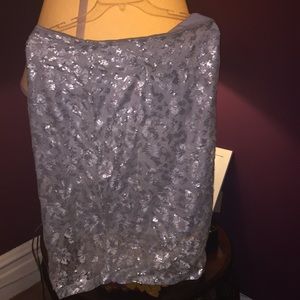 eva mendes floral with sequin silver skirt